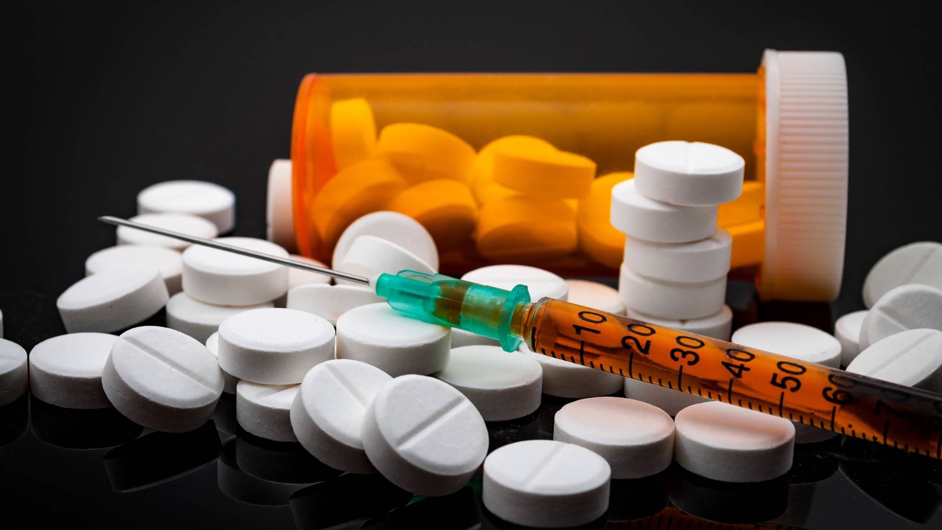 pills and syringe