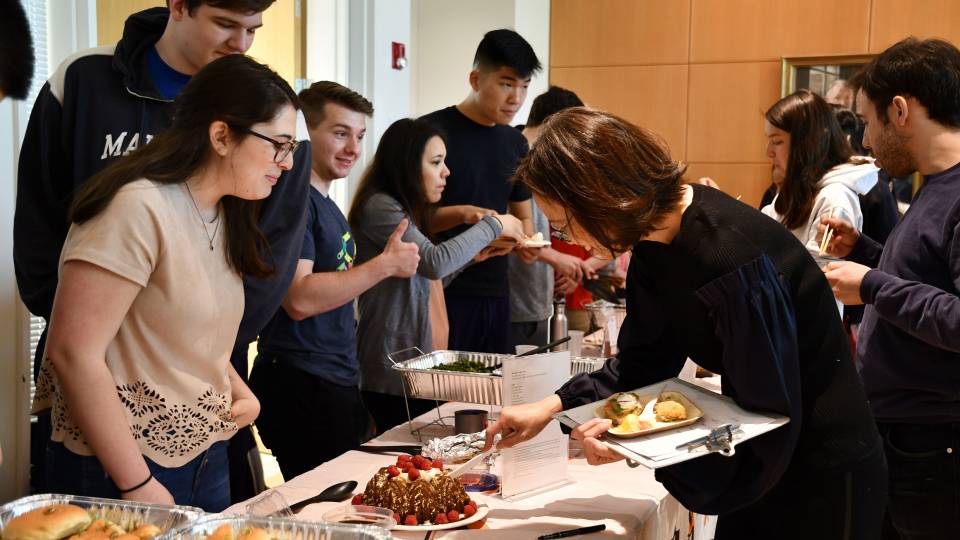 Students presenting food