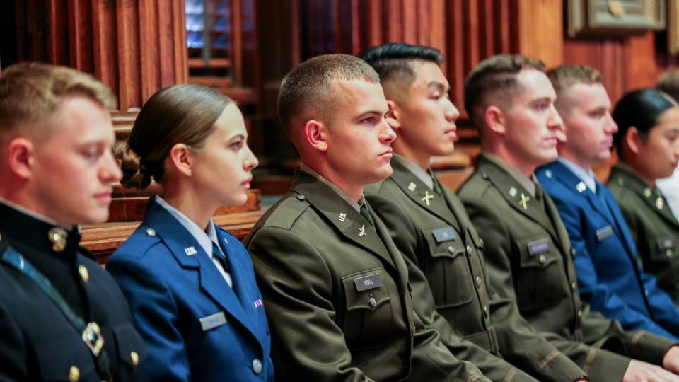 Commissioned Officers sitting in a row