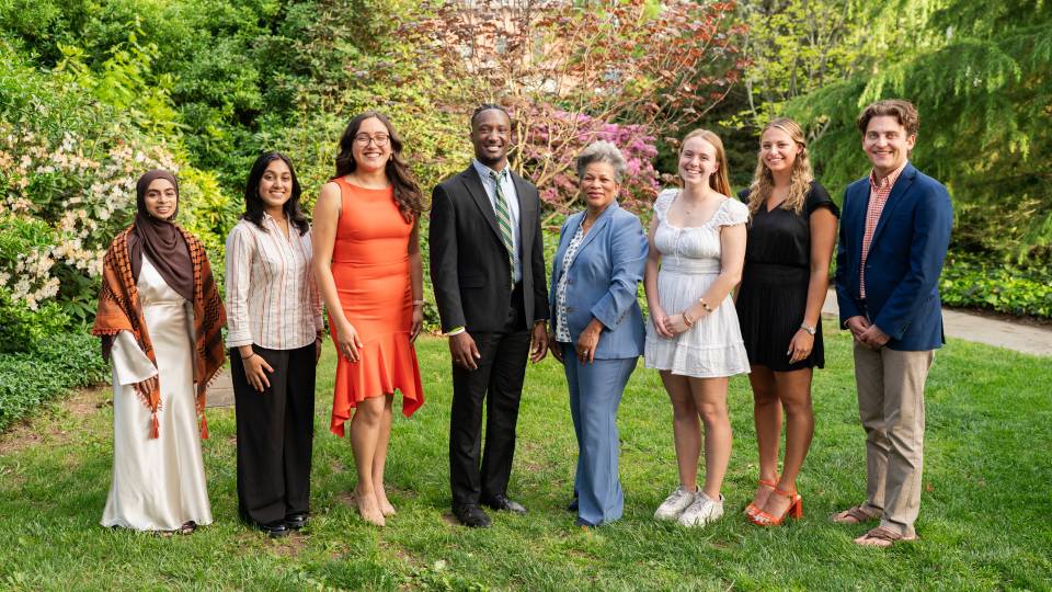 Vice president Calhoun poses with the student winners