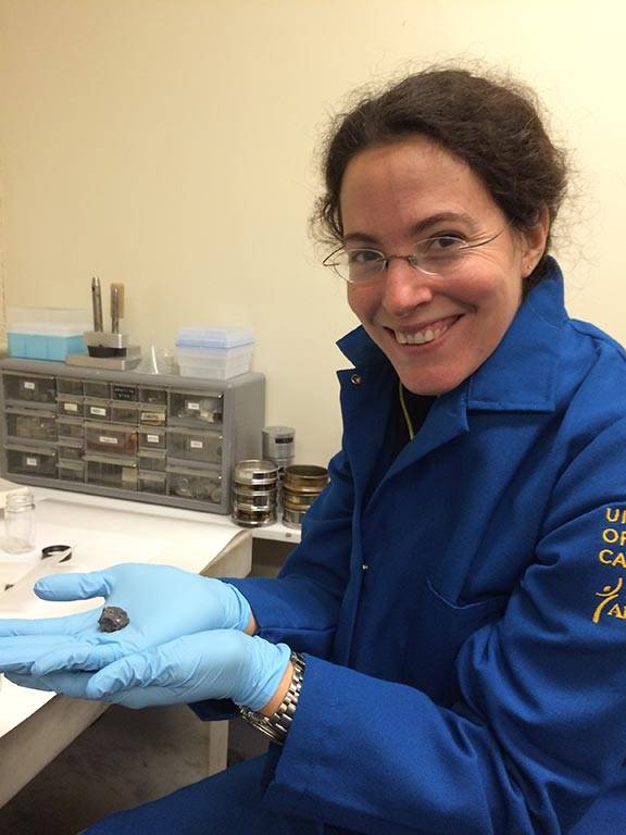 Melanie Barboni holding moon rock